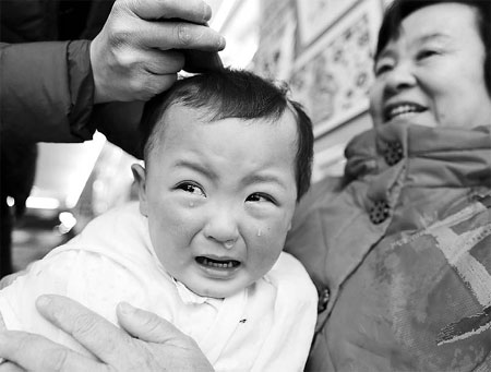 Barbers enjoy bumper day as traditionalists opt for lucky cut