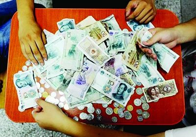 大學生撿垃圾 十年捐出20萬資助“山里娃” 圖