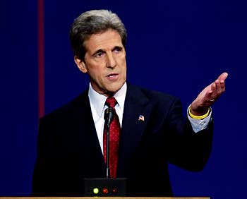 U.S. President George W. Bush makes a point during the first presidential debate with Democratic nominee John Kerry, at the University of Miami in Coral Gables, Florida September 30, 2004. The 90-minute, televised session will give voters their first chance to compare the candidates directly.