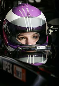 Britain's Katherine Legge prepares to start her Formula One test debut with a Minardi car at Vallelunga race track, north of Rome November 22, 2005.