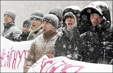 'Blackmail on gas won't cut it!' shout people during a rally at the Russian embassy in Kiev organised by Congress of Ukrainian Nationalists.