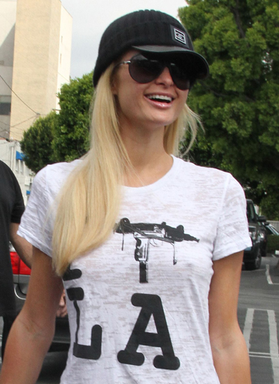 Paris Hilton gives dogs bedtime snack