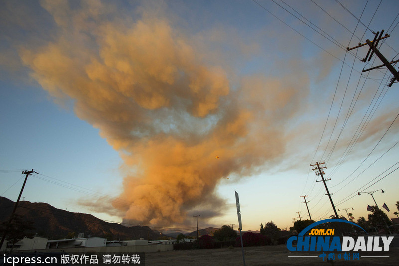 美洛杉磯發生山火 火勢兇猛出動直升機救火（圖）